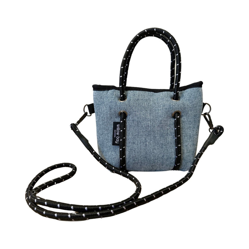 BOUTIQUE TINY Neoprene Tote Bag With Zip - BLUE DENIM-Willow Bay BOUTIQUE TINY Neoprene Tote Bag - Blue Denim The newest addition to the Boutique Family, meet the Tiny! This bag is seriously cool. The perfect companion when needing to store only your essentials. It will comfortably fit your phone, lippy, purse and keys and comes with a cool detachable crossbody strap so it can be used as a cute mini bag and/or a crossbody bag.
The Tiny has the same signature full closure zip as our Boutique and Boutique Mi